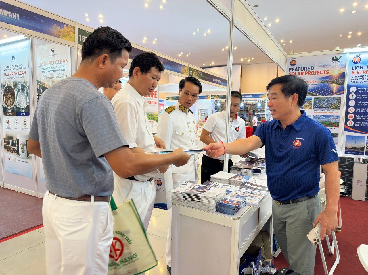 Discussing TTP Group's power and energy solutions with visitors.